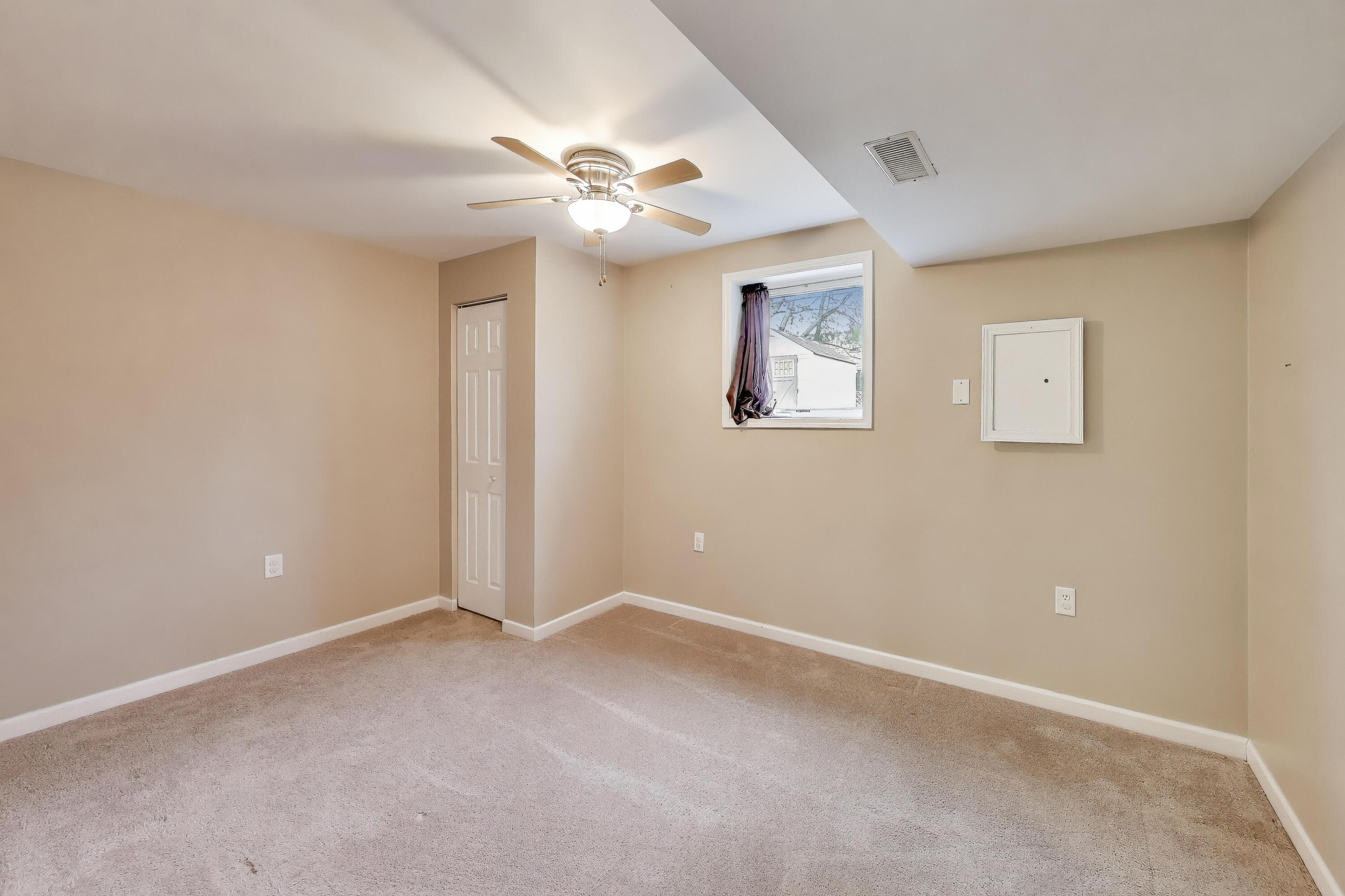 816 East 39th Lane Griffith, IN 46319 - Photo 26 of 42 a view of an empty room with a window