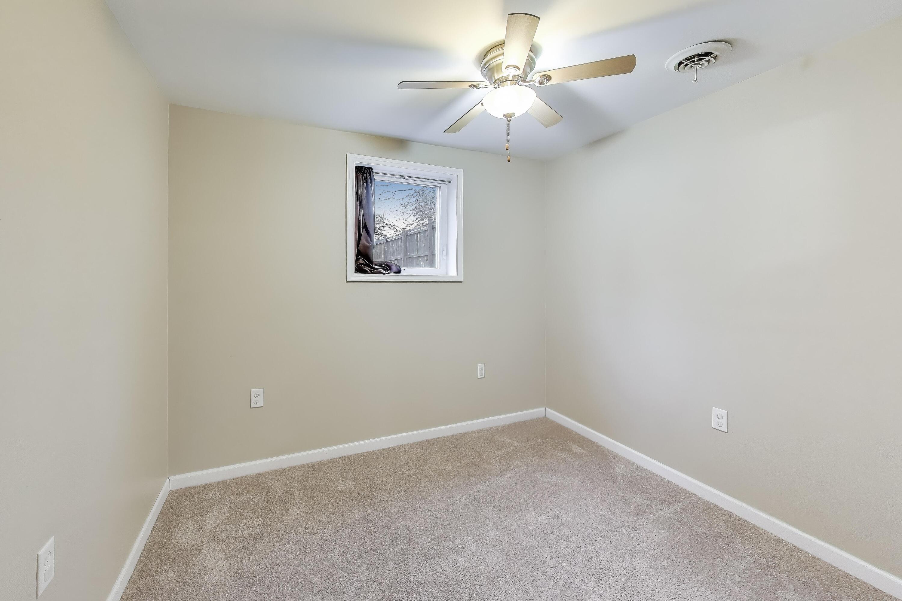 816 East 39th Lane Griffith, IN 46319 - Photo 28 of 42 an empty room with a window
