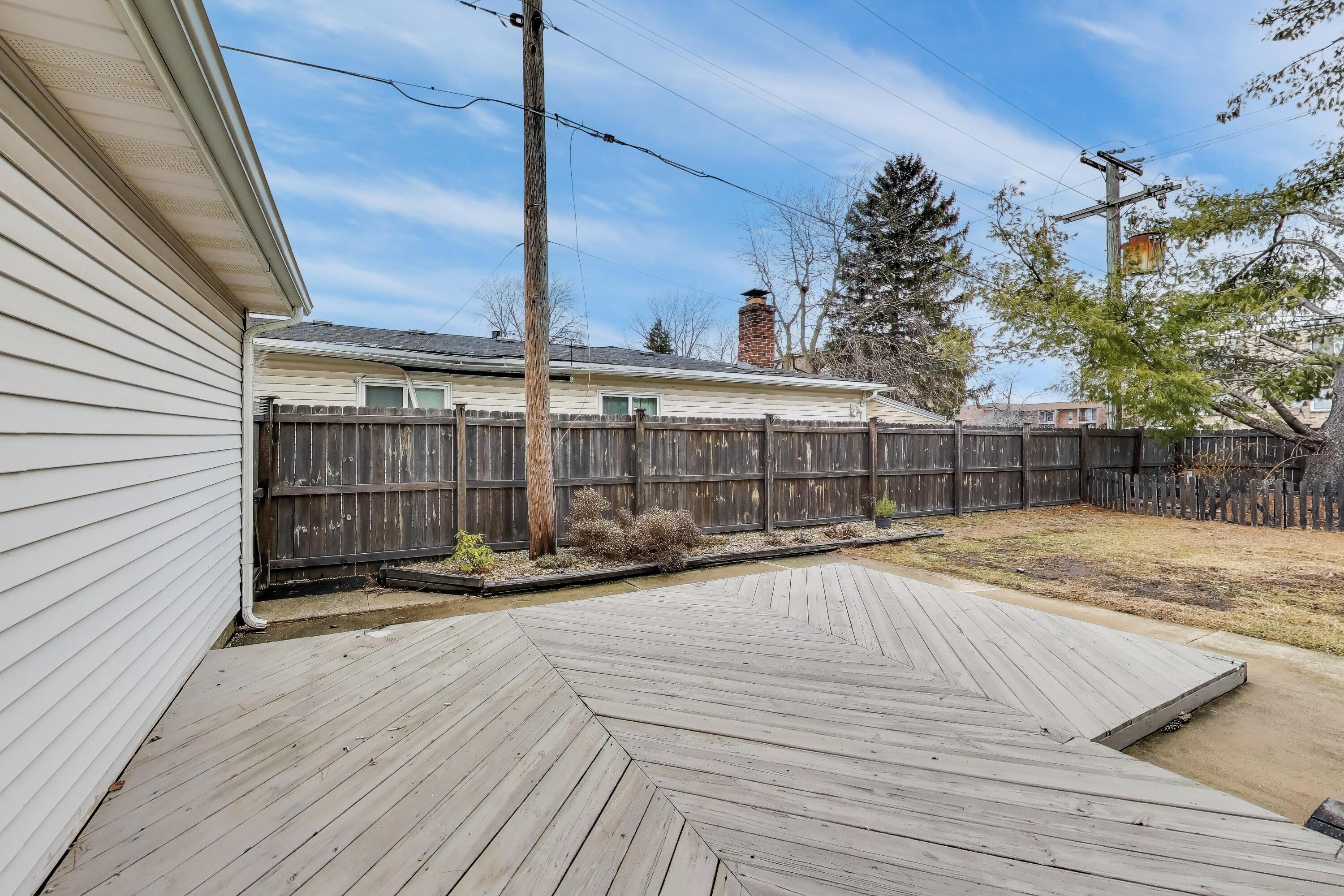 816 East 39th Lane Griffith, IN 46319 - Photo 32 of 42 a view of a house with a patio