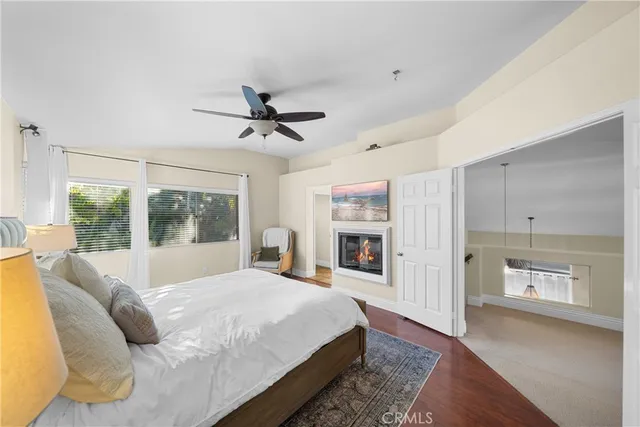 a bed room with a bed and a fireplace