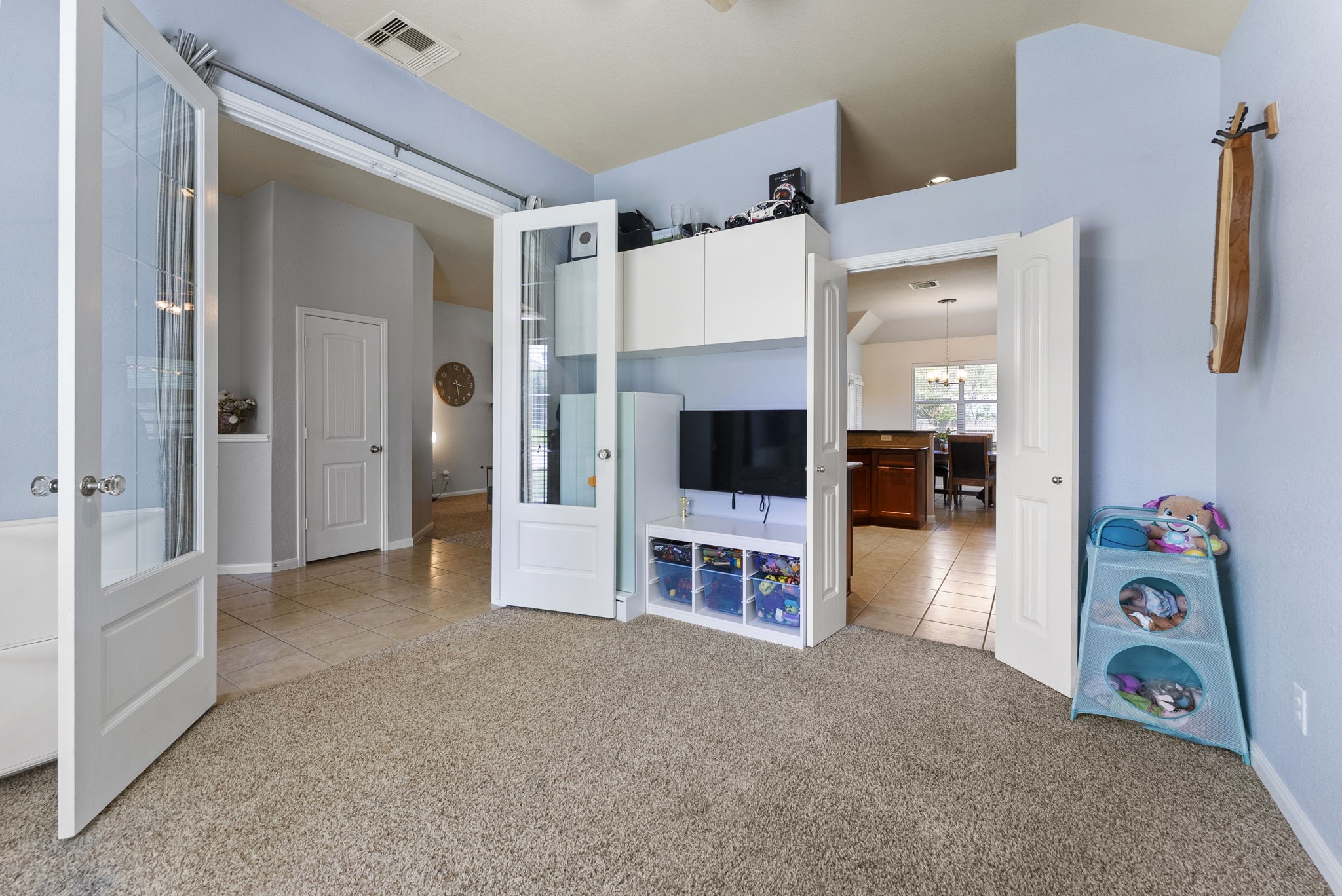 174 Maple Grove Drive Conroe, TX 77384 - Photo 6 of 26 Versatile enough to serve as a playroom, game room, or home office — the possibilities are endless!