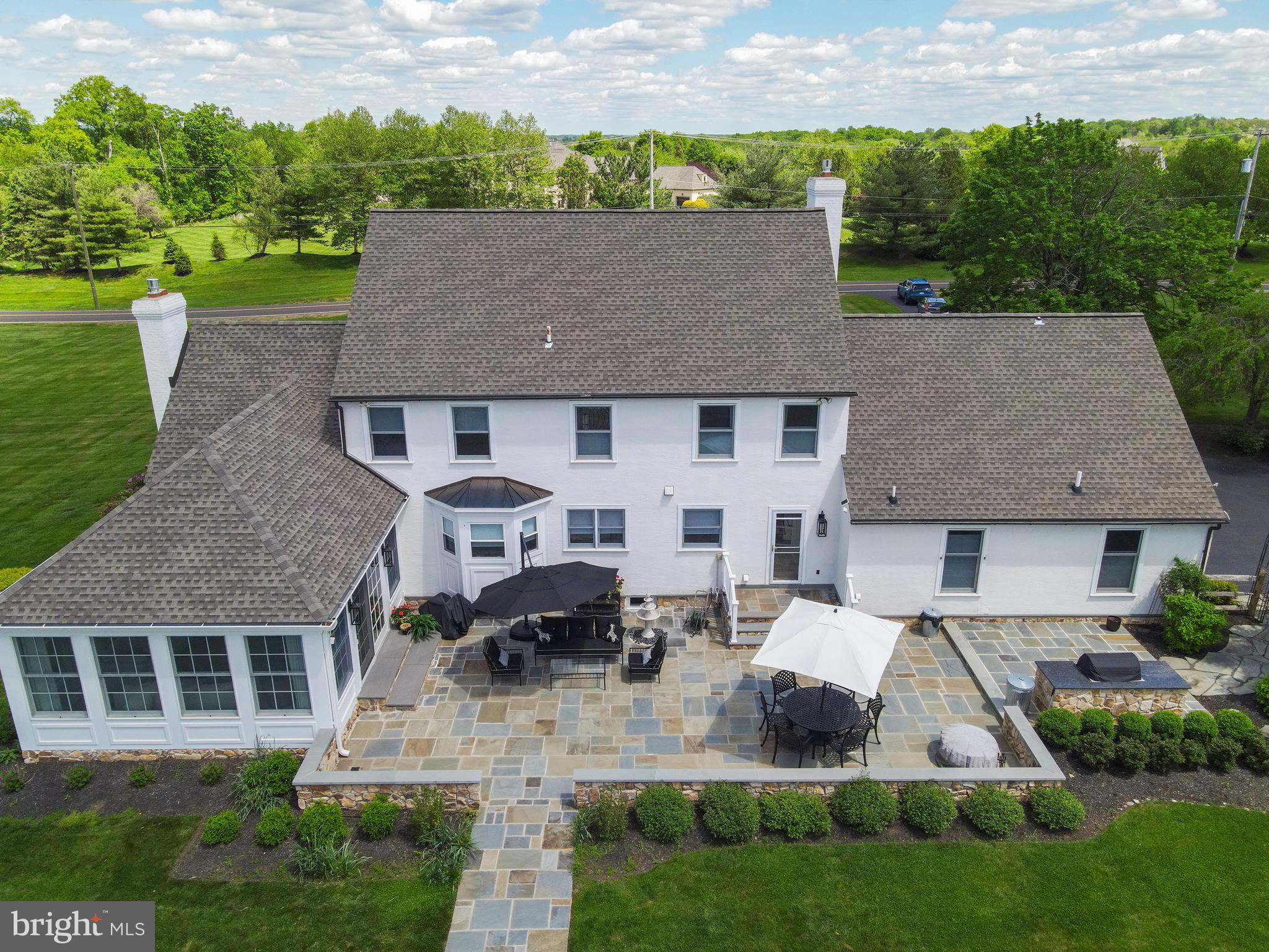 1071 Highland Road Newtown, PA 18940 - Photo 34 of 40 a aerial view of a house with a yard patio and plants