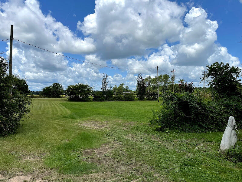 5161 Griffith Mill Road Holt, FL 32564 - Photo 8 of 25 a view of a golf course with green space