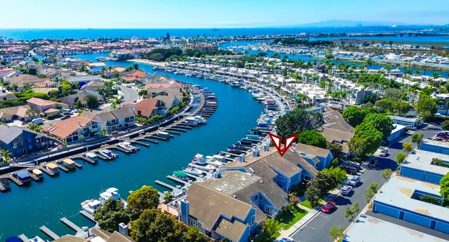 an aerial view of a city and lake view