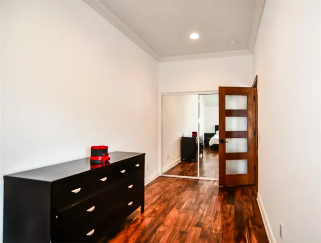 a bathroom with a sink a mirror and shower