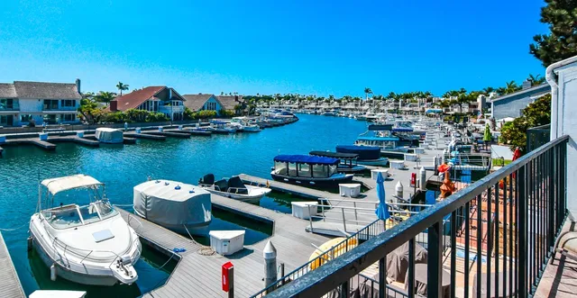 a view of a balcony with outdoor seating