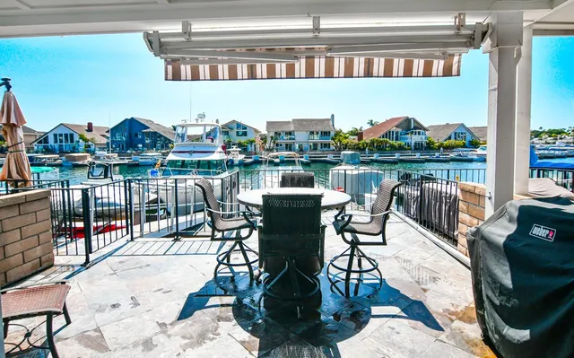 an aerial view of a city with ocean view