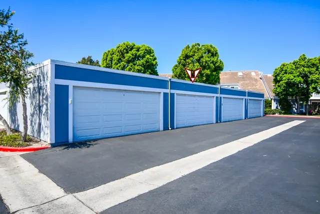 a view of a chairs and table in patio