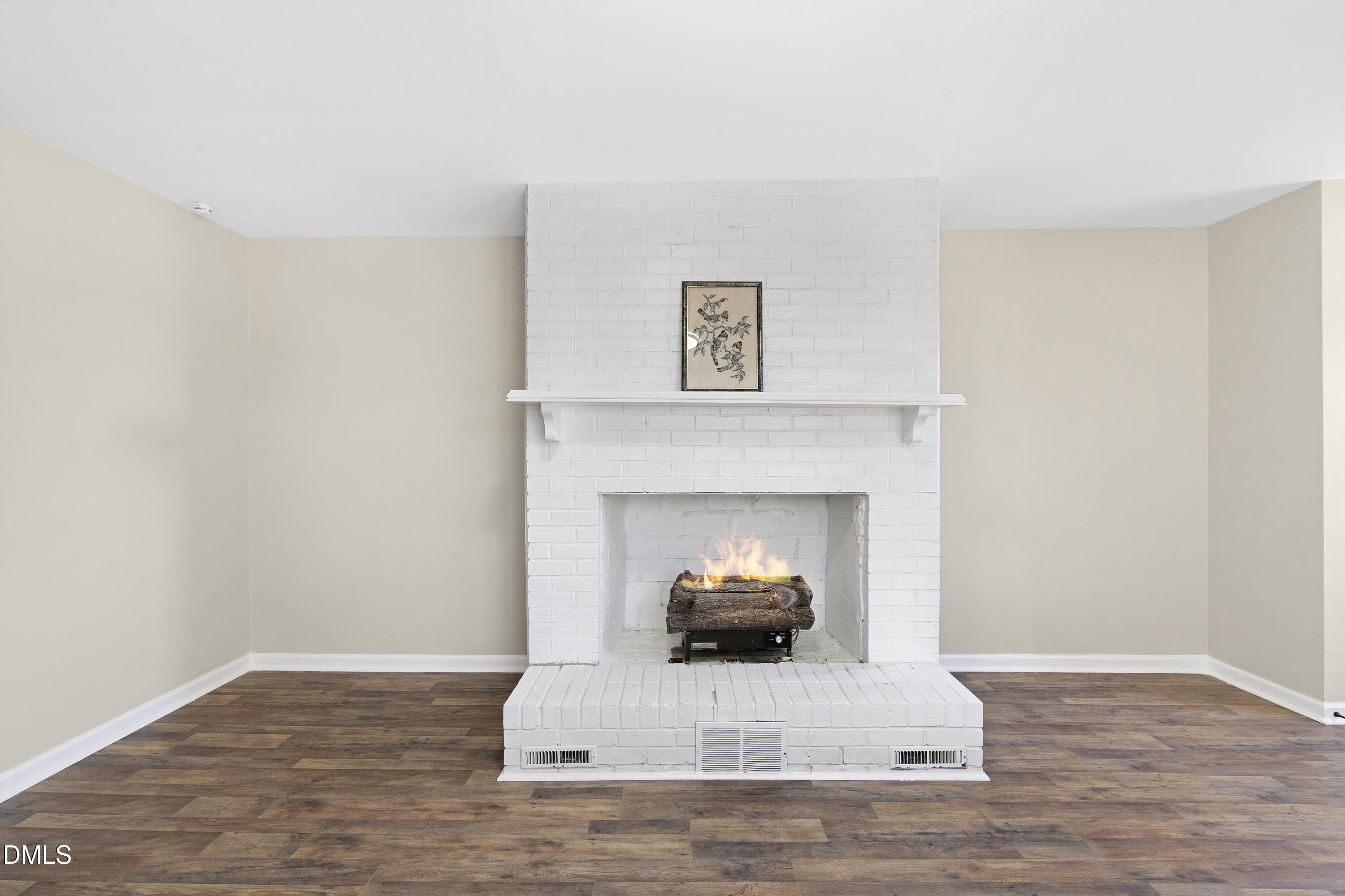 231 Faith Church Road Four Oaks, NC 27524 - Photo 13 of 47 a living room with furniture and a fireplace