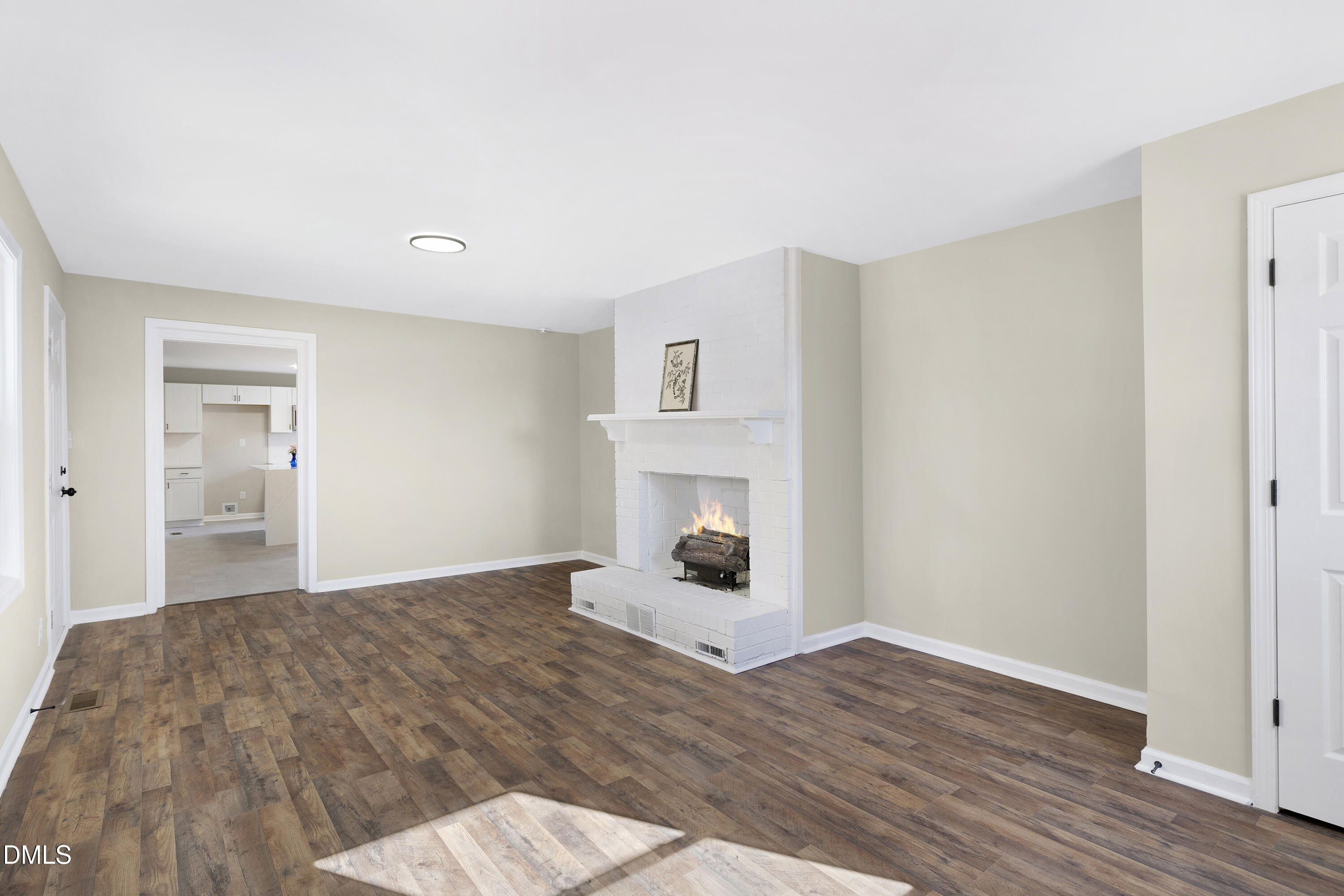 231 Faith Church Road Four Oaks, NC 27524 - Photo 14 of 47 a bedroom with a bed and a fireplace