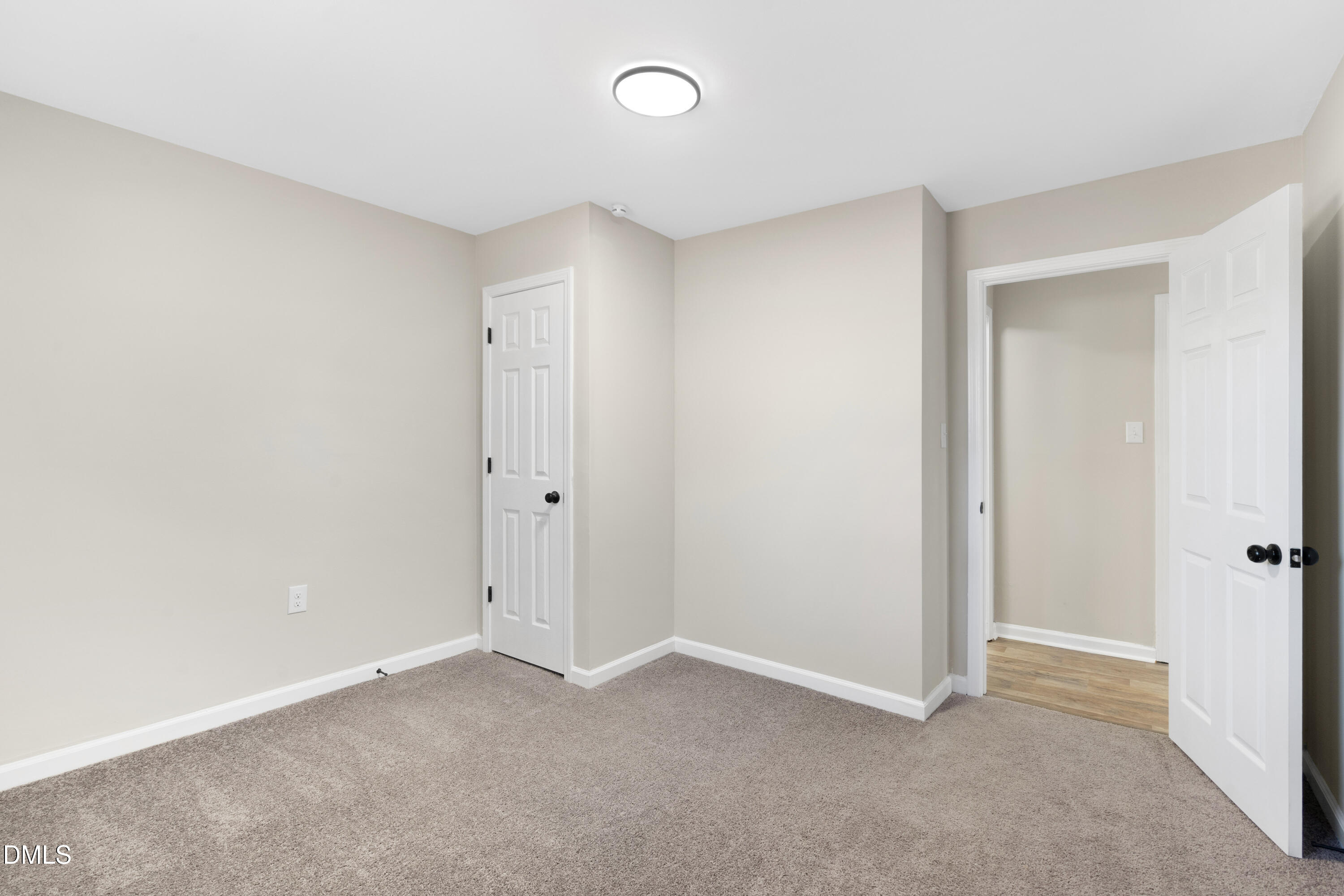 231 Faith Church Road Four Oaks, NC 27524 - Photo 31 of 47 a view of an empty room and closet area