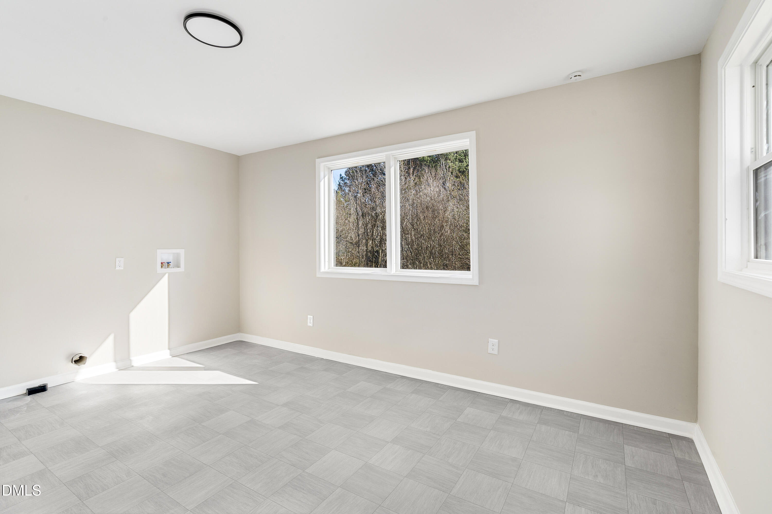 231 Faith Church Road Four Oaks, NC 27524 - Photo 32 of 47 an empty room with windows