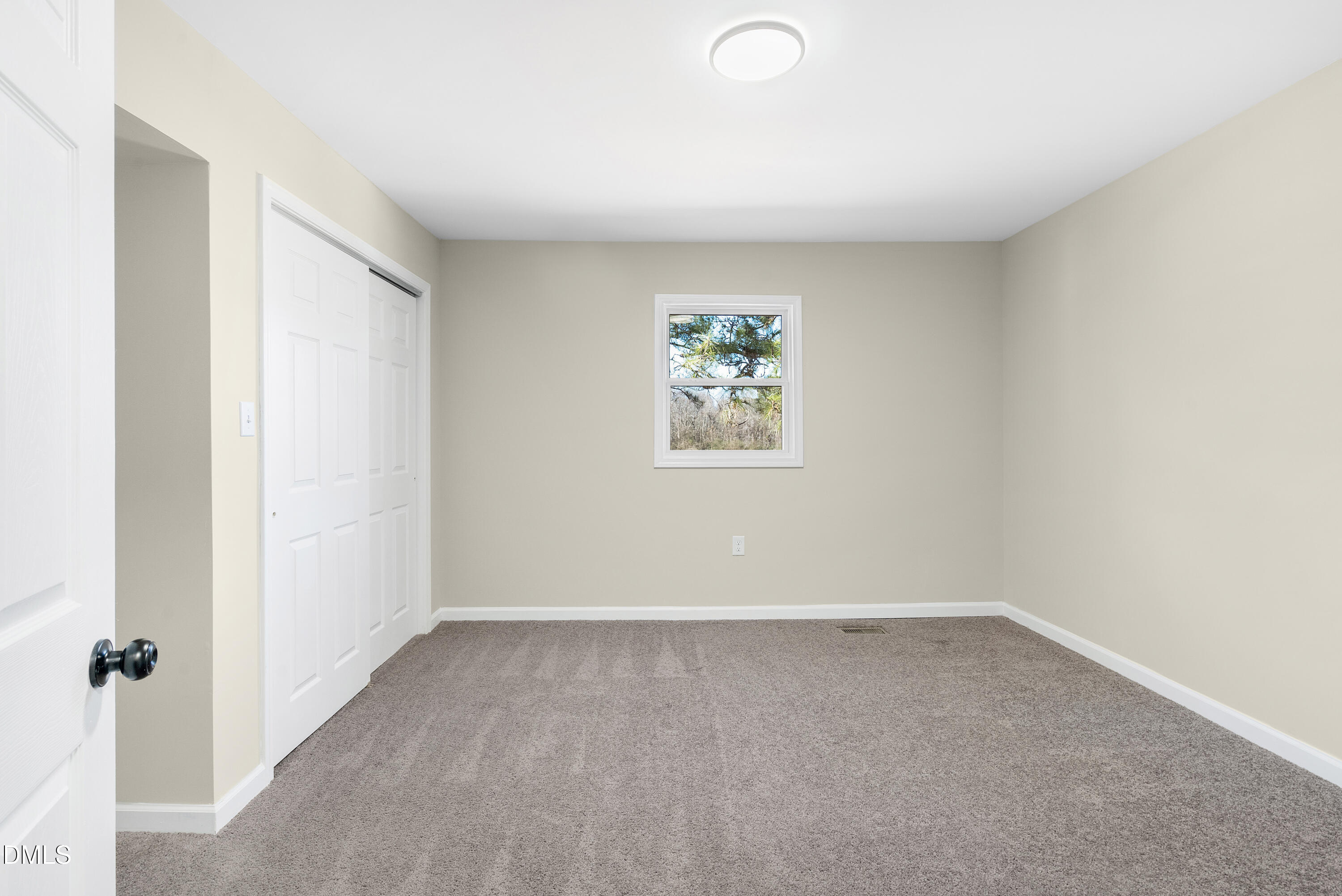 231 Faith Church Road Four Oaks, NC 27524 - Photo 35 of 47 an empty room with a window