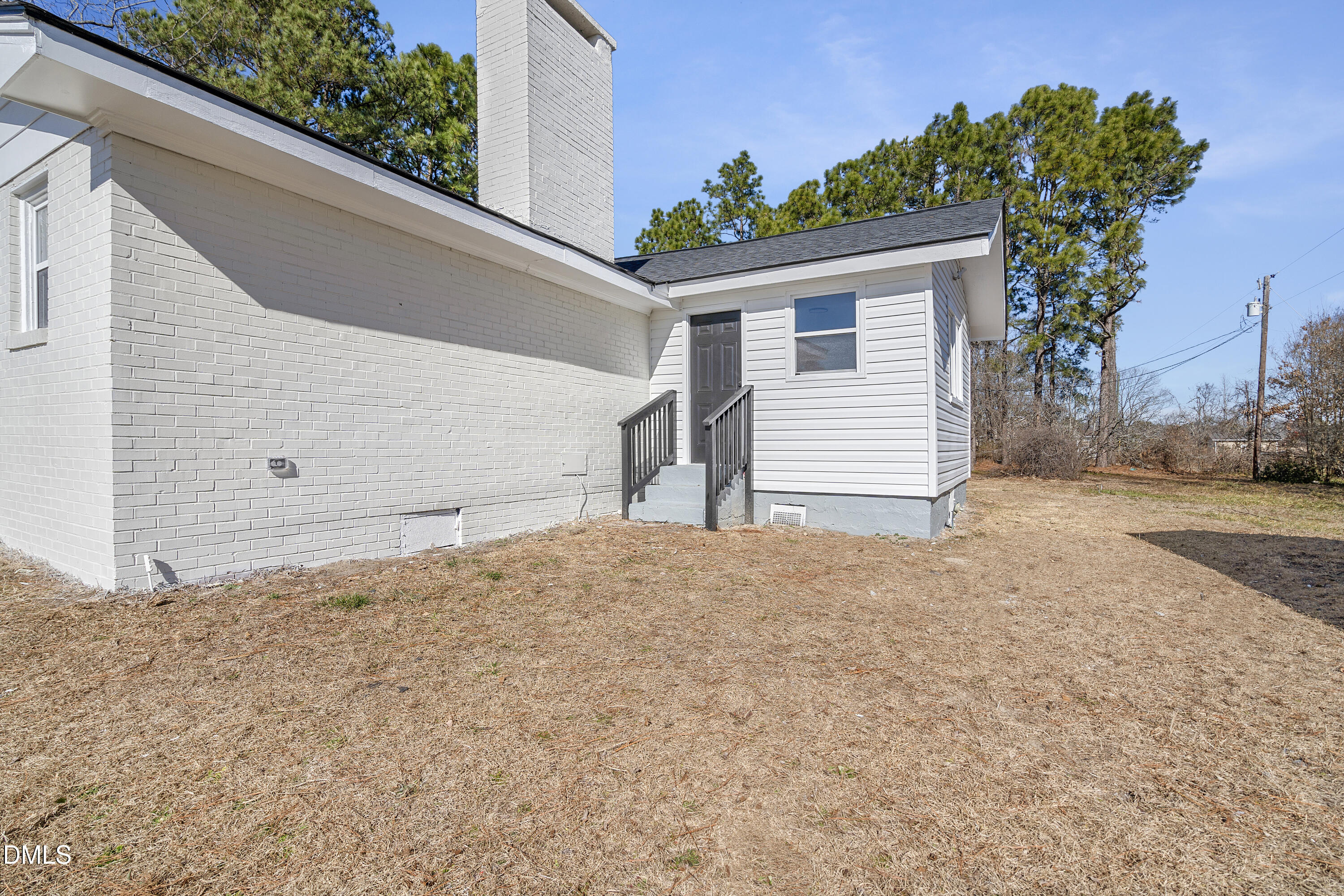 231 Faith Church Road Four Oaks, NC 27524 - Photo 36 of 47 a backyard of a house