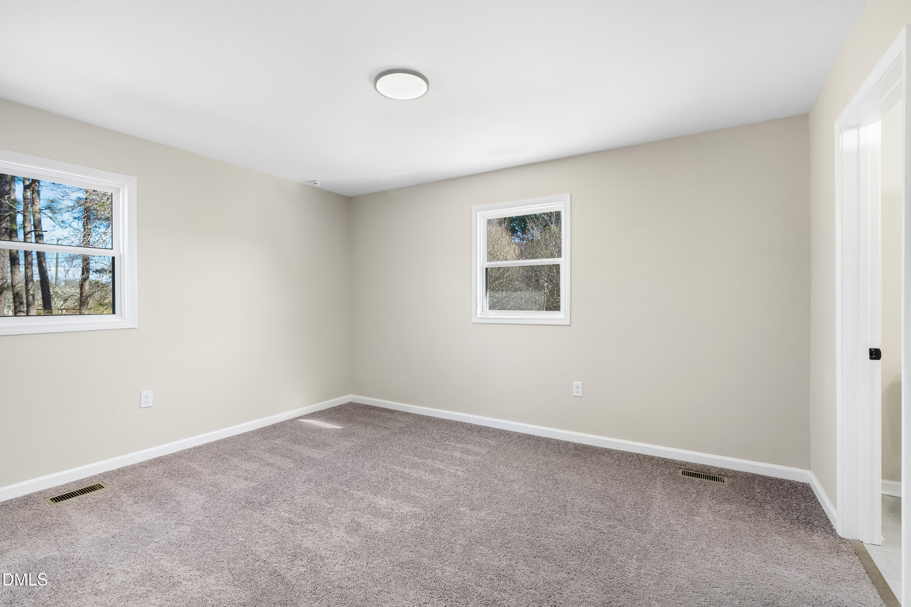 231 Faith Church Road Four Oaks, NC 27524 - Photo 39 of 47 an empty room with windows