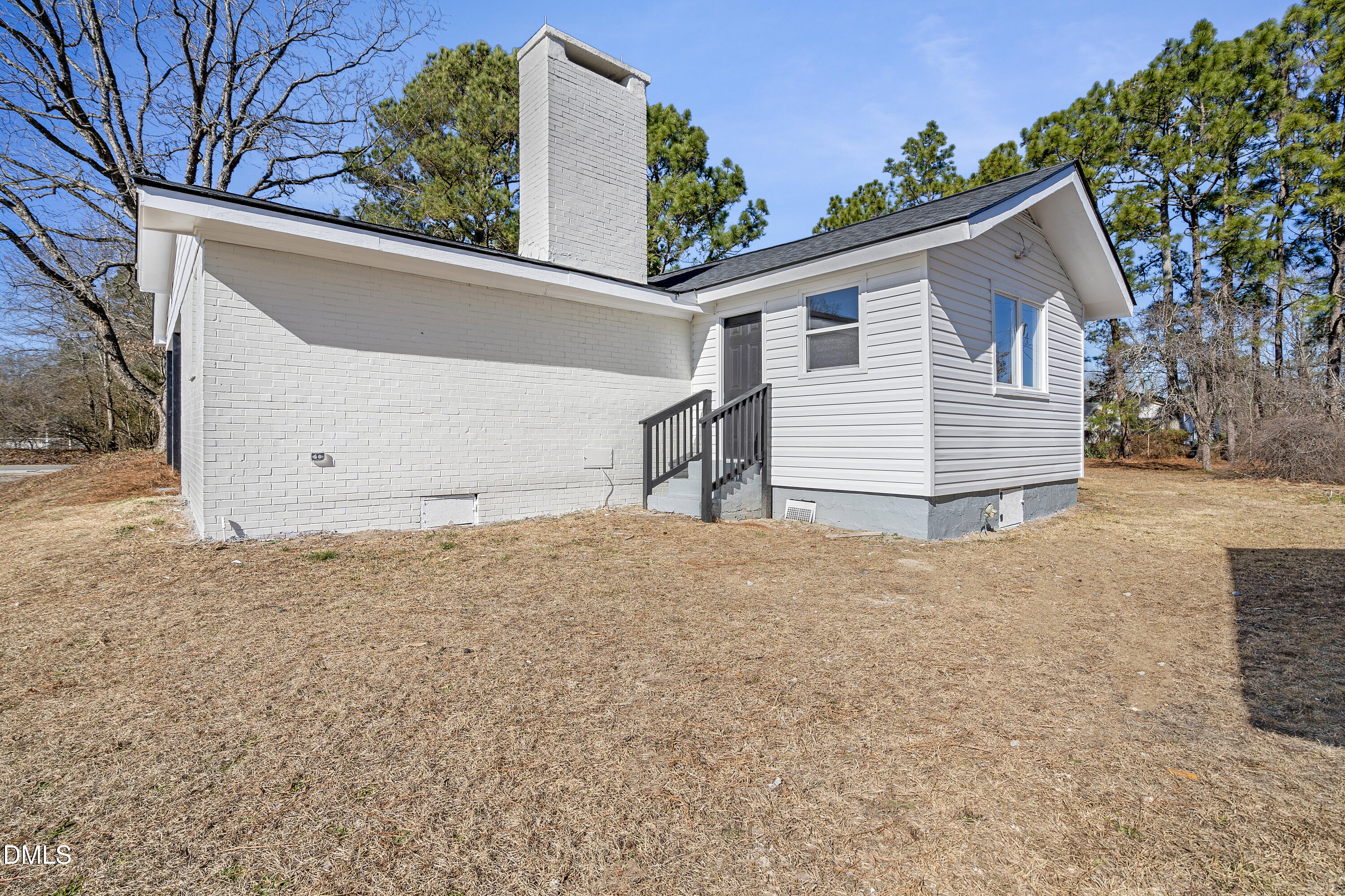 231 Faith Church Road Four Oaks, NC 27524 - Photo 40 of 47 a backyard of a house