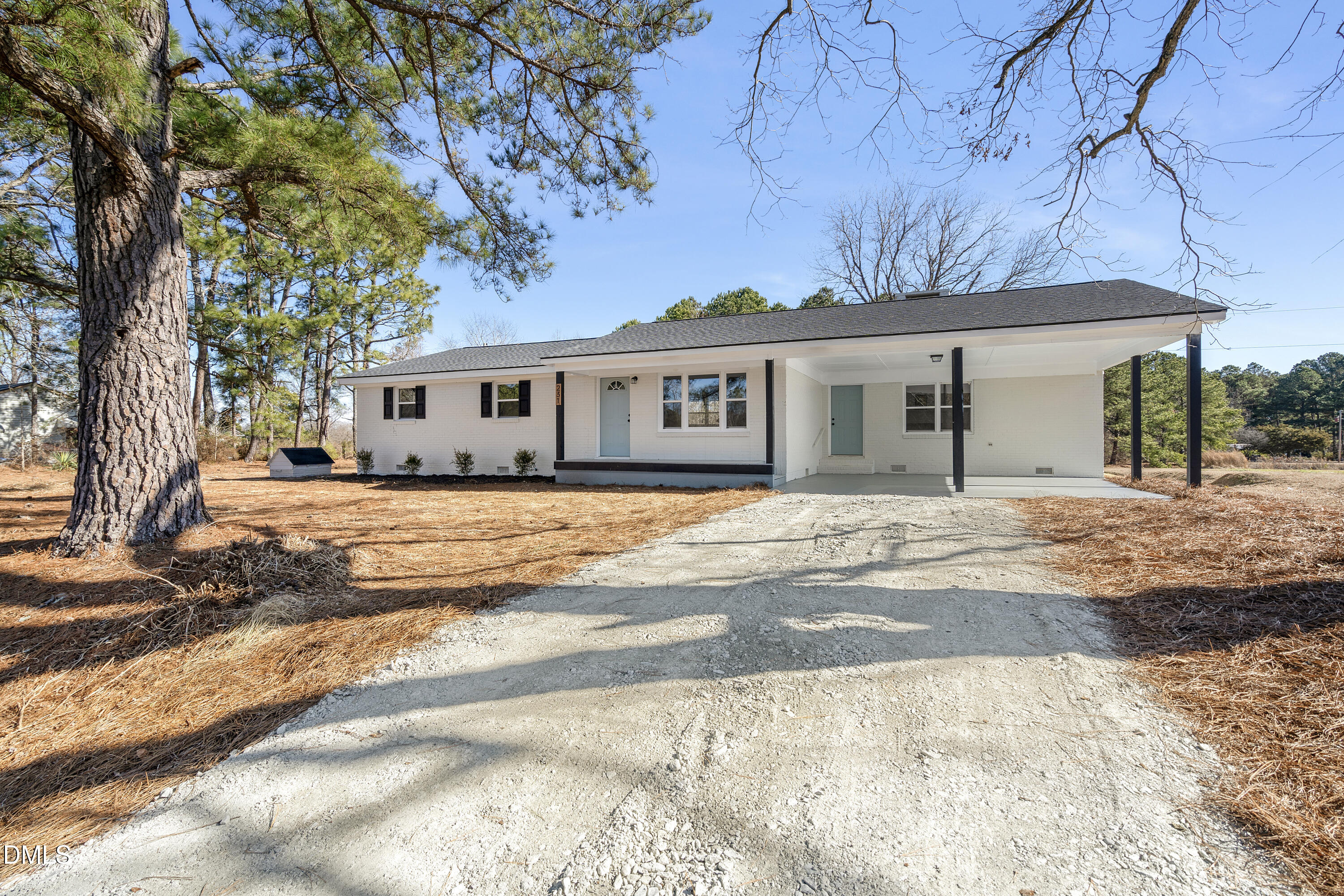 231 Faith Church Road Four Oaks, NC 27524 - Photo 7 of 47 a front view of a house with a yard