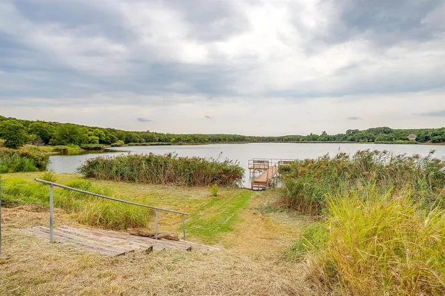 a view of a balcony with lake view