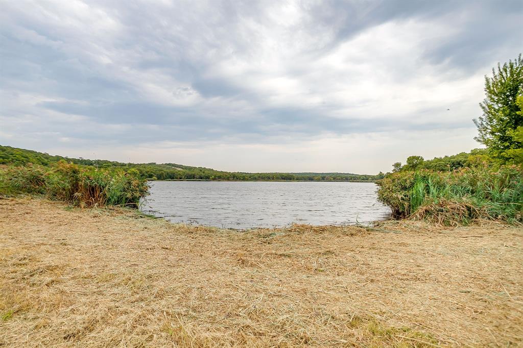 205 Pheasant Run Court Sunset, TX 76270 - Photo 21 of 28 a view of a lake view