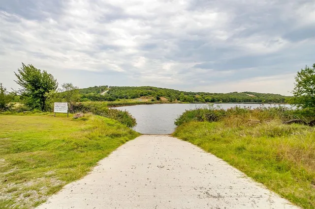 a view of a lake with a city