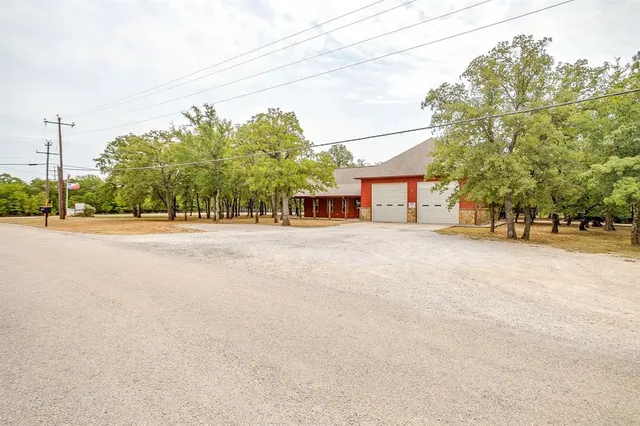 a view of a road with a yard