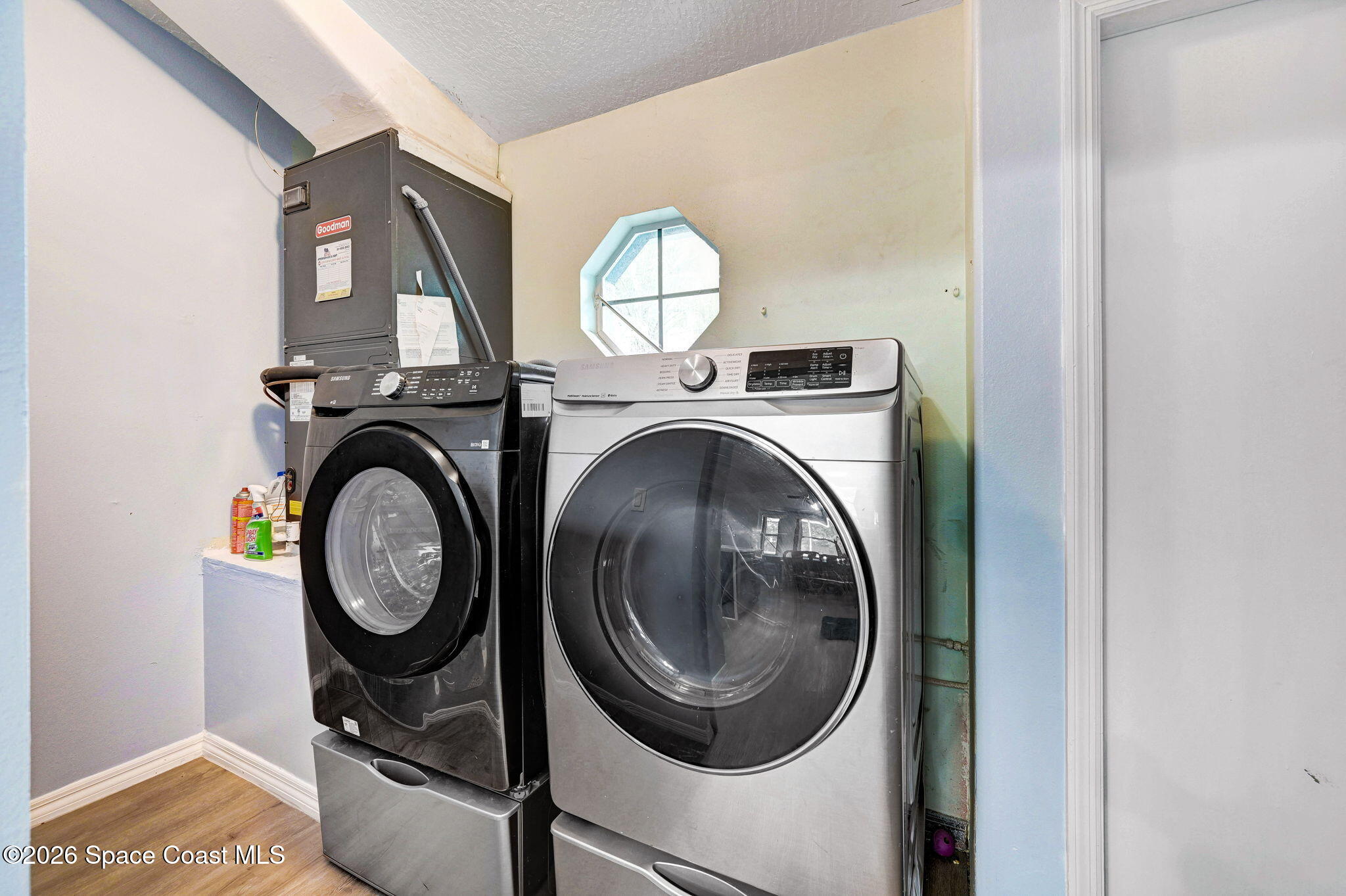 7155 Export Avenue Cocoa, FL 32927 - Photo 18 of 31 a view of a storage and utility room with washer and dryer