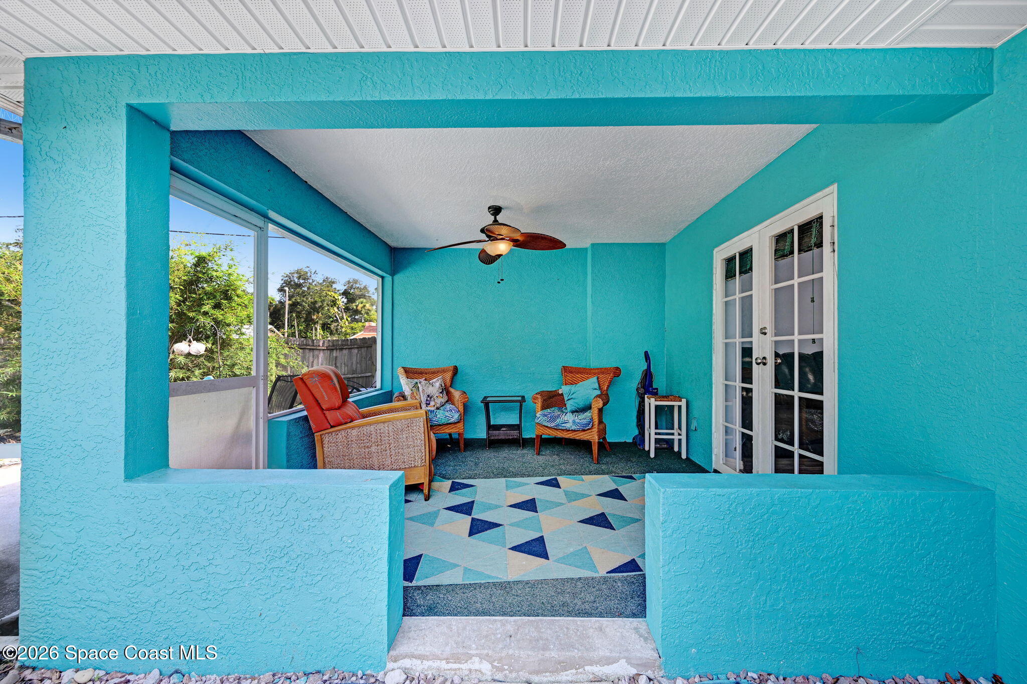 7155 Export Avenue Cocoa, FL 32927 - Photo 24 of 31 a outdoor living space with furniture and a potted plant