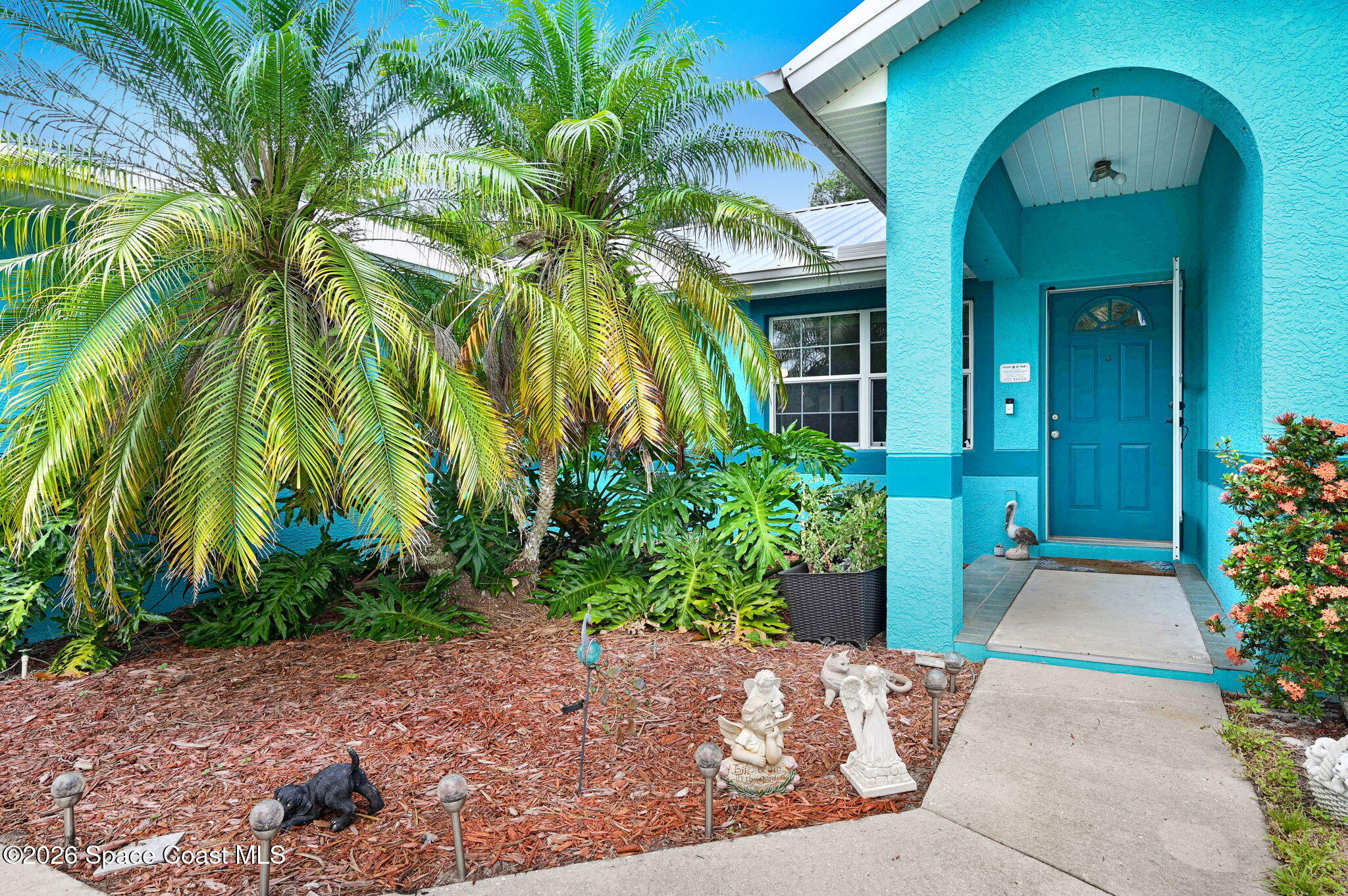 7155 Export Avenue Cocoa, FL 32927 - Photo 5 of 31 a front view of a house with a yard