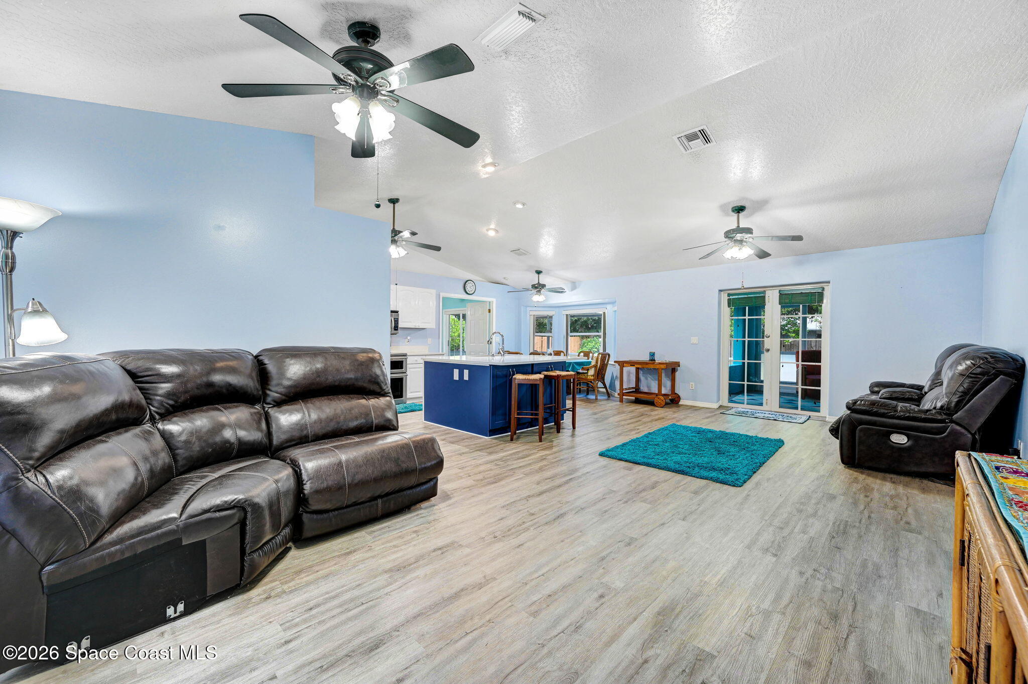 7155 Export Avenue Cocoa, FL 32927 - Photo 7 of 31 a living room with furniture and a large window