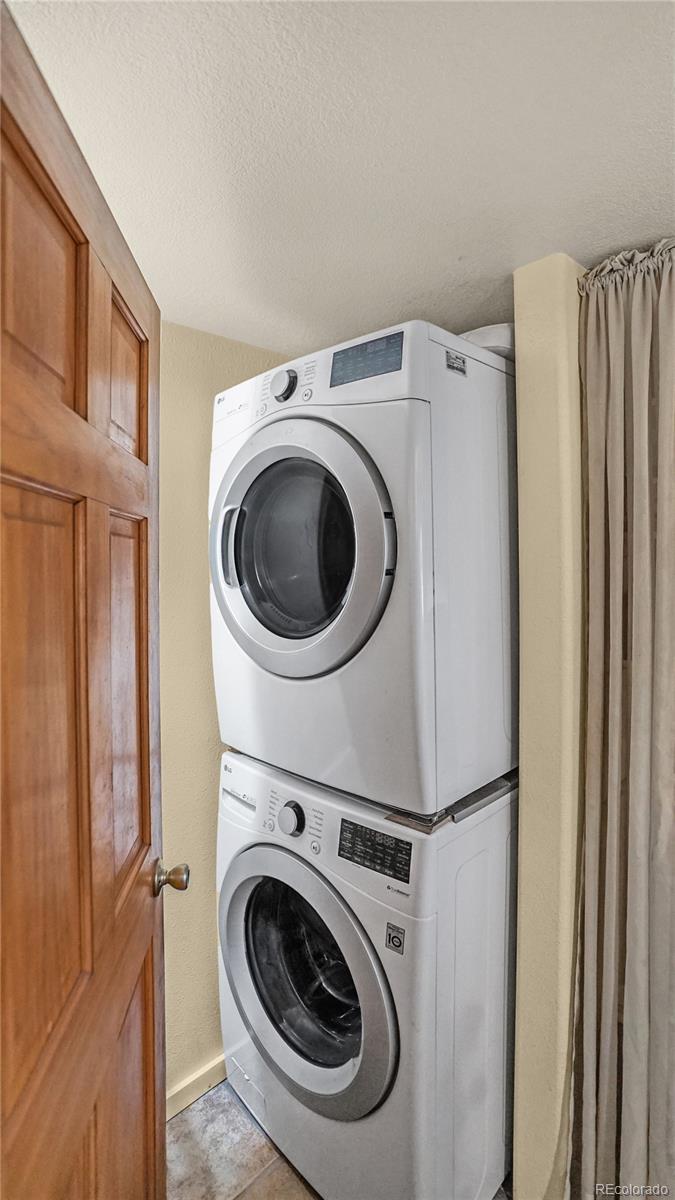39 Cowan Road Bailey, CO 80421 - Photo 11 of 24 a utility room with dryer and washer