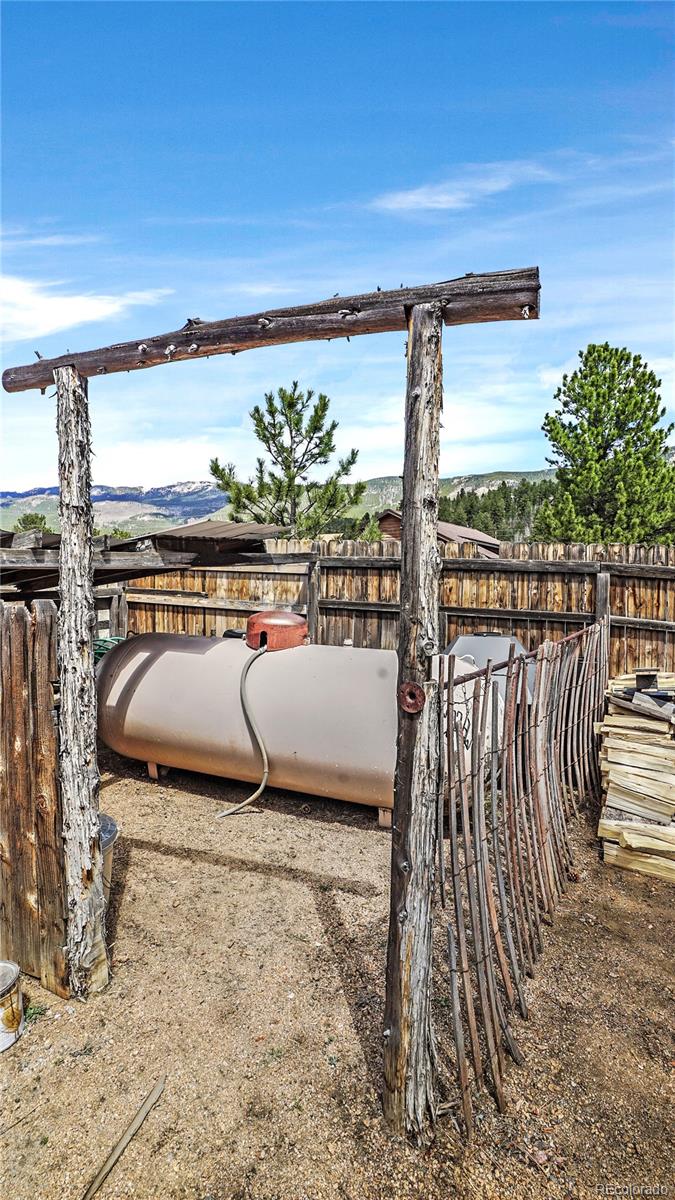 39 Cowan Road Bailey, CO 80421 - Photo 23 of 24 a view of a balcony with chairs and a table
