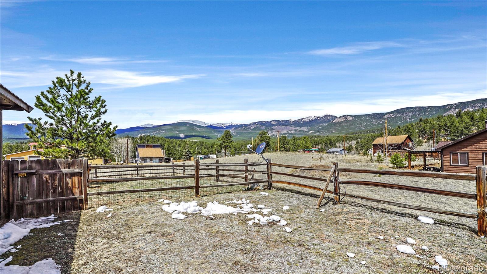 39 Cowan Road Bailey, CO 80421 - Photo 24 of 24 a view of a terrace with a bench