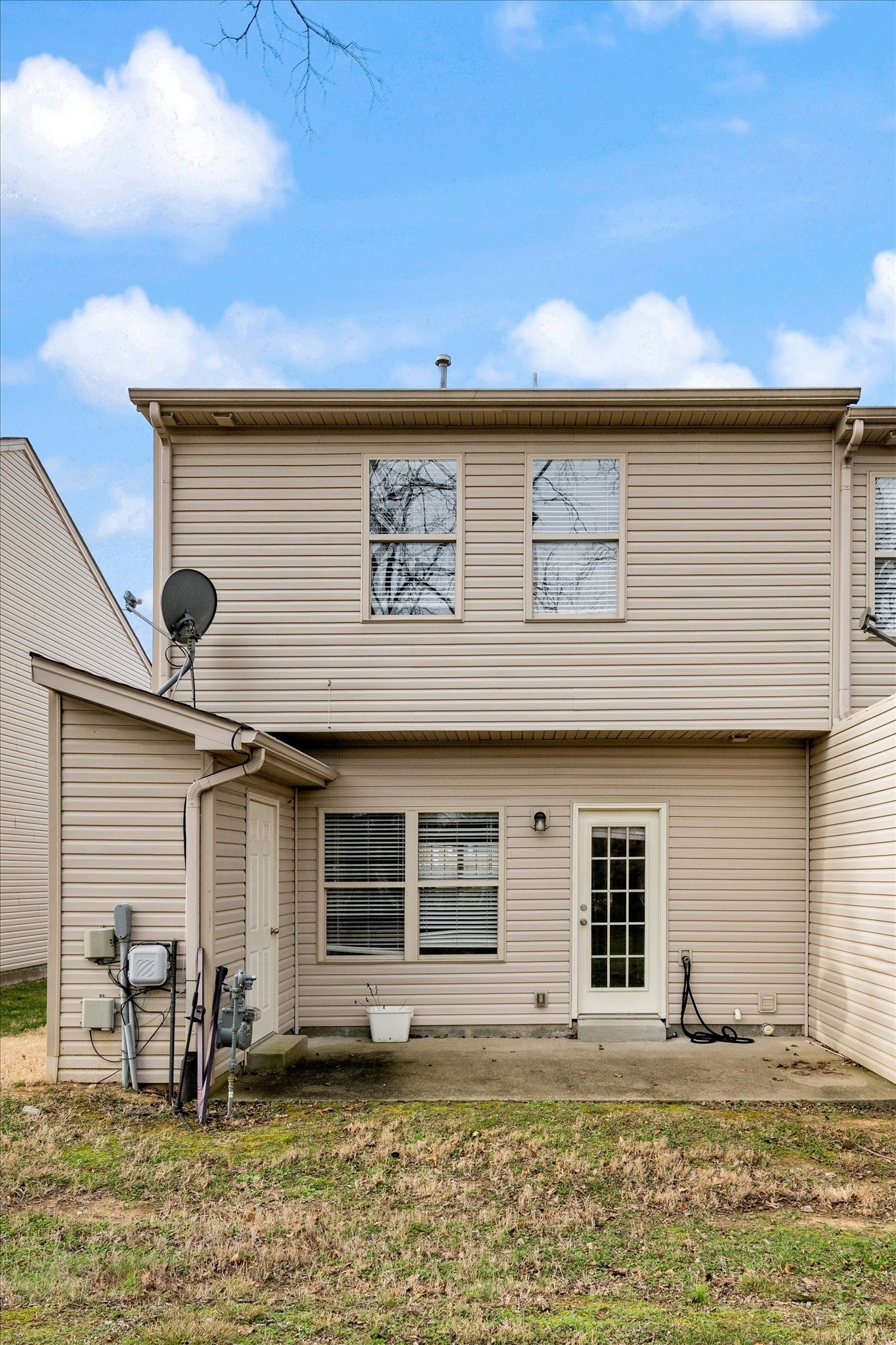 735 Tulip Grove Road, Unit 311 Hermitage, TN 37076 - Photo 20 of 22 a view of a house with a swimming pool