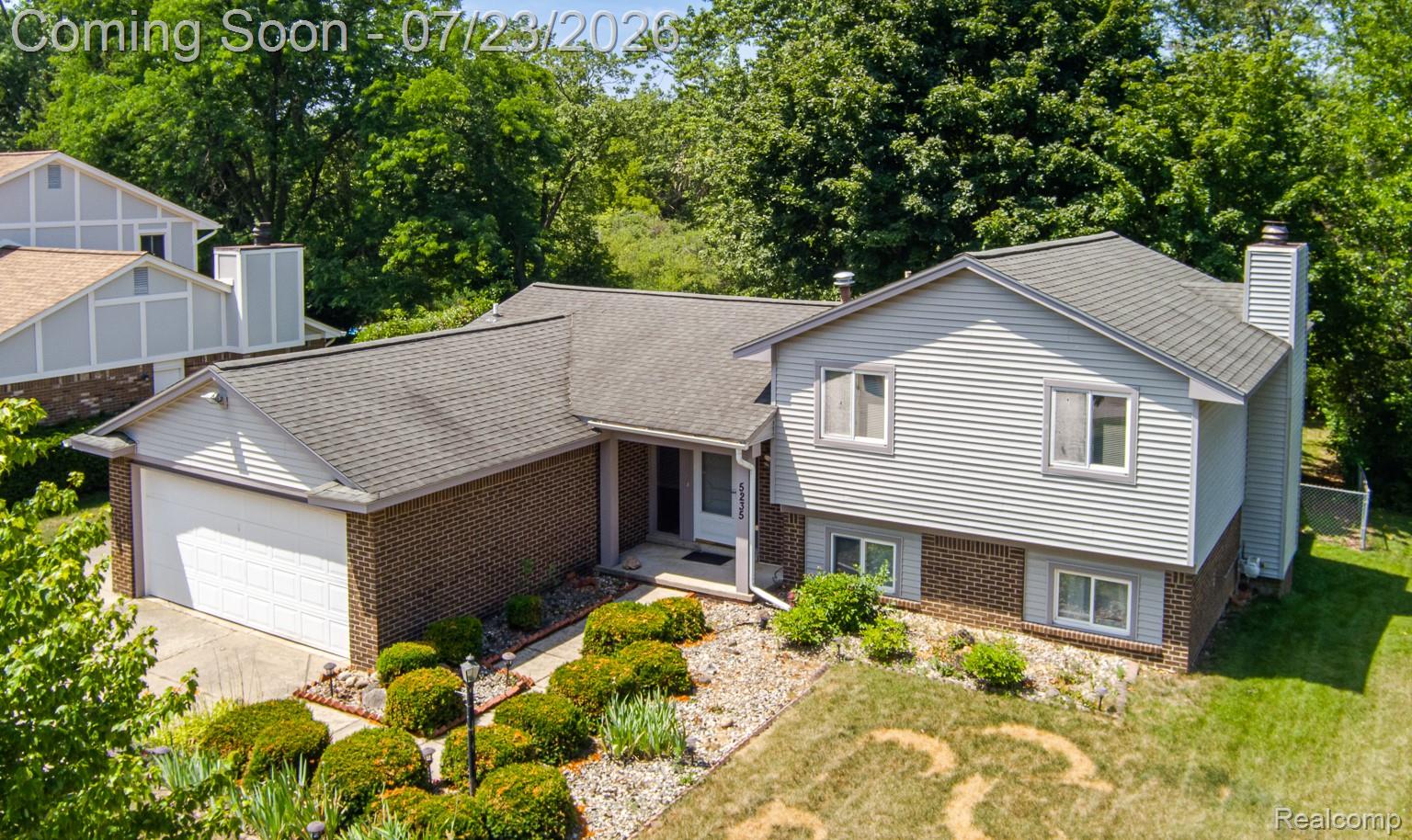 5235 Timber Ridge Trail Clarkston, MI 48346 - Photo 5 of 56 Low maintenance brick and vinyl (2016) exterior...actual lawn