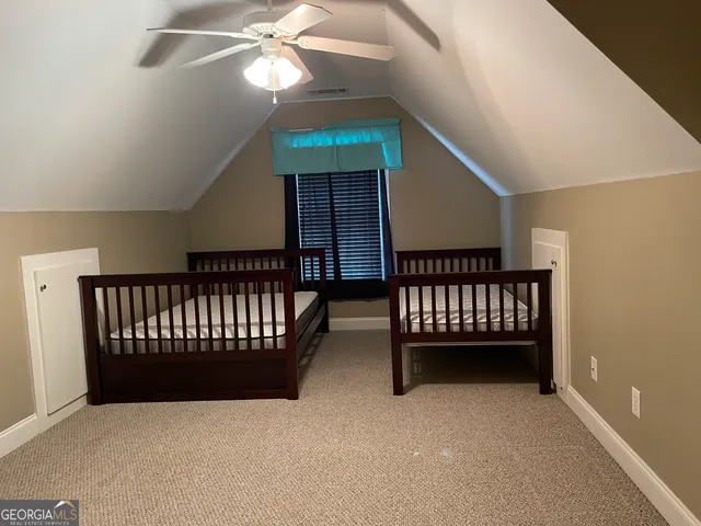 a view of entryway with a balcony