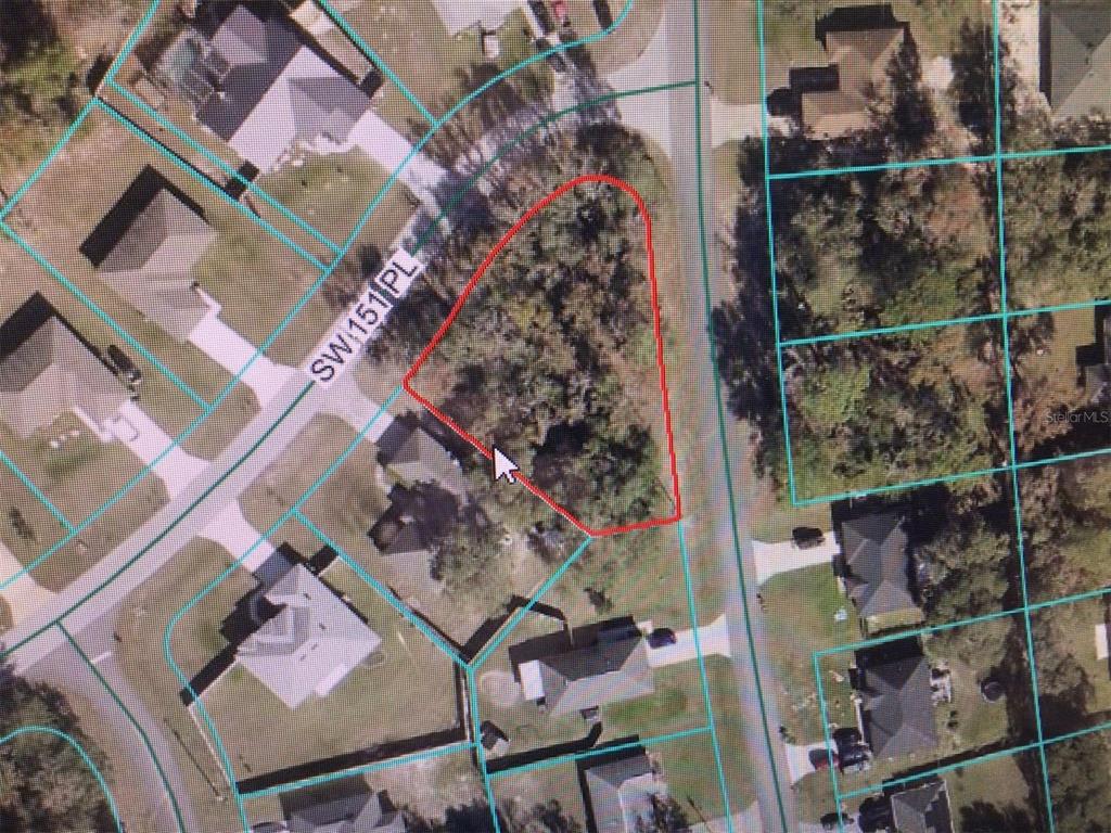 0 Southwest 151 Place Ocala, FL 34482 - Photo 2 of 15 an aerial view of a house with a yard