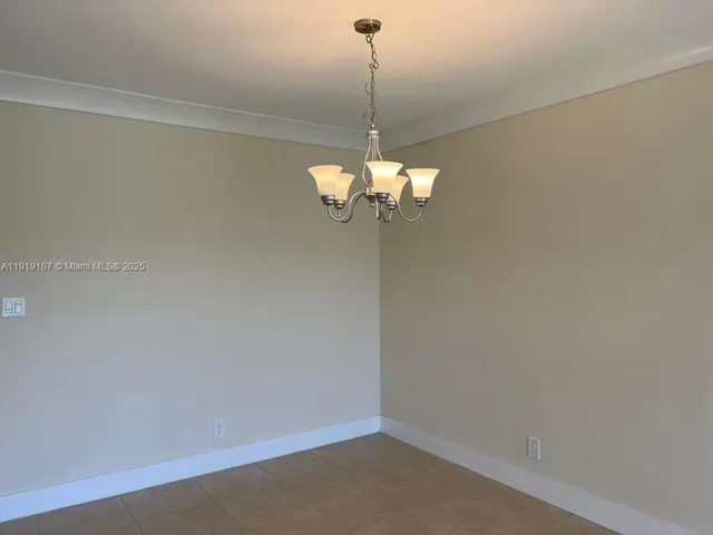 a view of a chandelier in a room