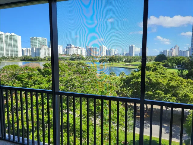 a view of mountain from a balcony