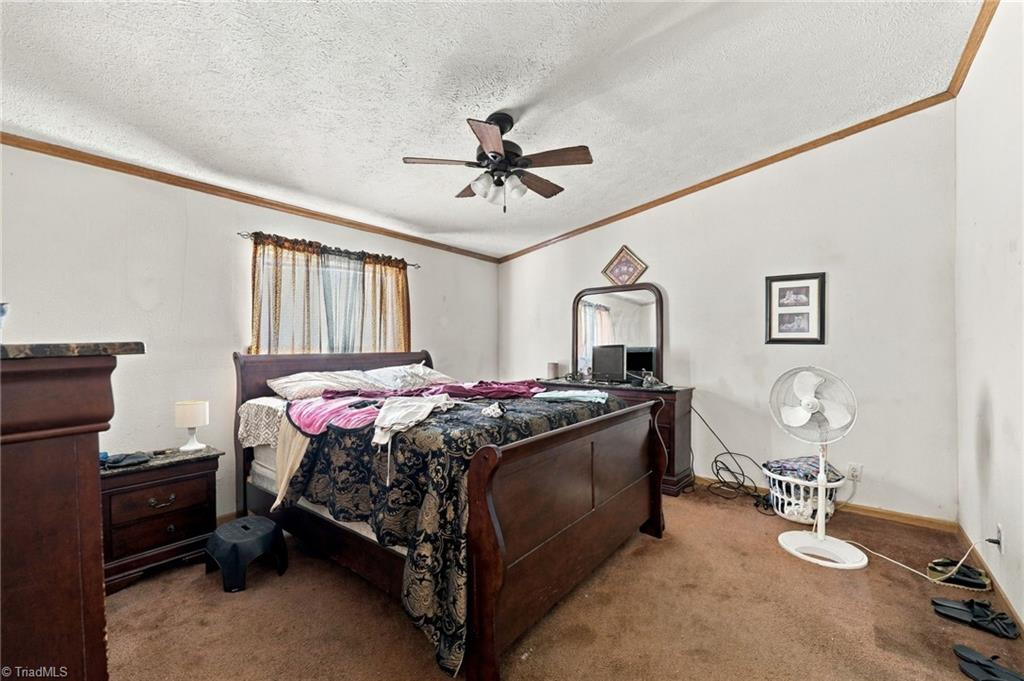 415 Talley Road Reidsville, NC 27320 - Photo 6 of 31 Primary bedroom with ceiling fan.
