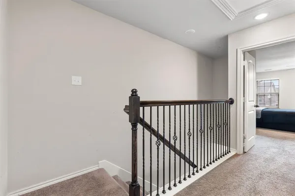 a view of a hallway with a livingroom