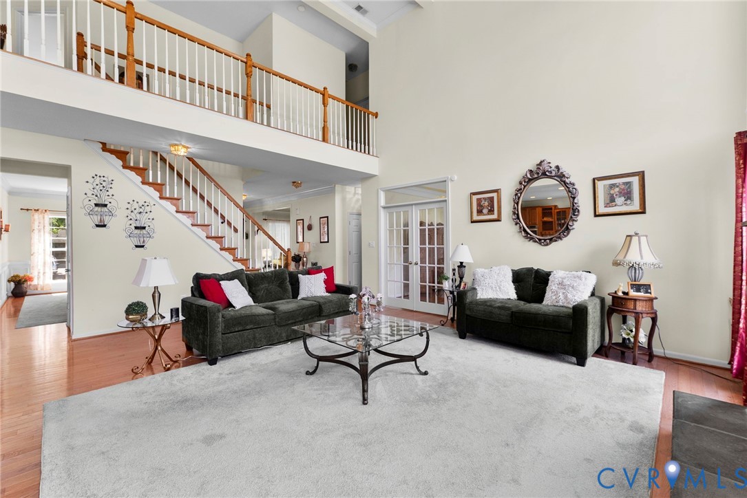 753 Blossom Tree Road Culpeper, VA 22701 - Photo 20 of 68 Two-story living area featuring a vaulted ceiling,