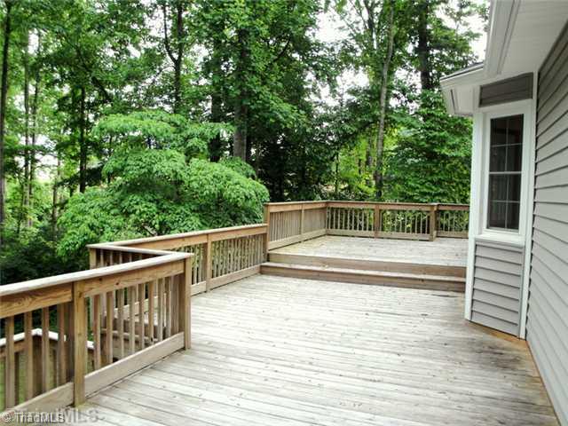398 Farmstead Road Winston-Salem, NC 27107 - Photo 12 of 16 Exterior Back. The two level deck wraps around the back of the home.