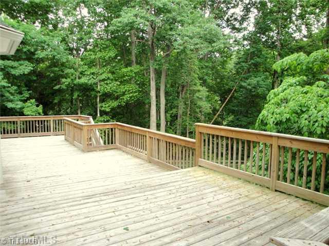 398 Farmstead Road Winston-Salem, NC 27107 - Photo 13 of 16 Patio/Deck. The oversized deck overlooks the gorgeous wooded backyard!