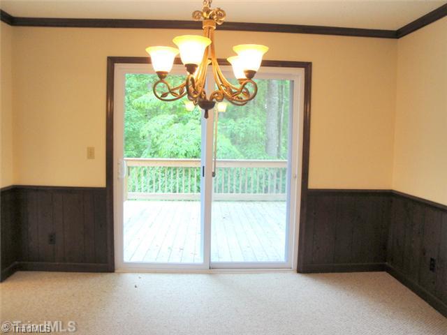 398 Farmstead Road Winston-Salem, NC 27107 - Photo 5 of 16 Dining Room. Sliding Doors in the Dining Room provide an excellent view of the deck and gorgeous backyard!