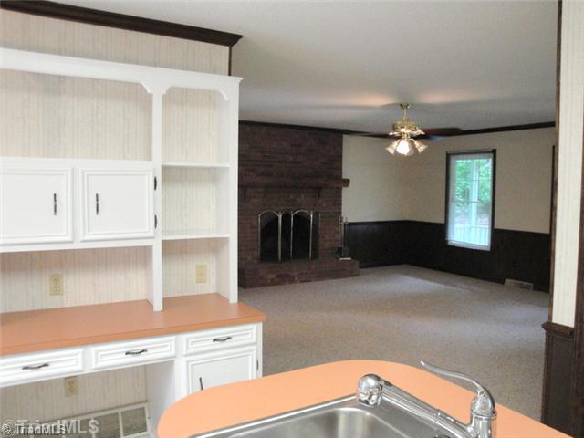 398 Farmstead Road Winston-Salem, NC 27107 - Photo 9 of 16 Interior Space/Layout. This home has a wonderful open feel and great flow as seen here in the Kitchen looking into the Living Room.