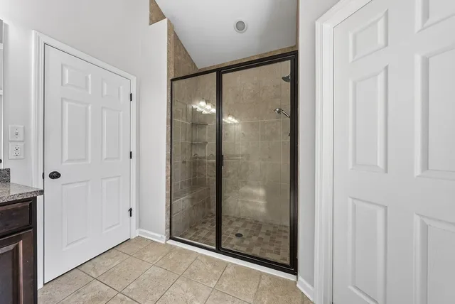 a kitchen with stainless steel appliances granite countertop a stove and a sink