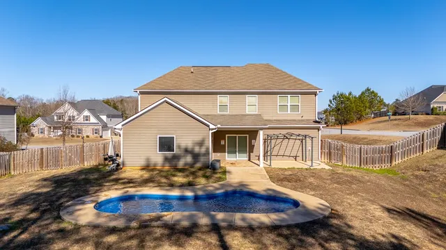 a view of the backyard of house