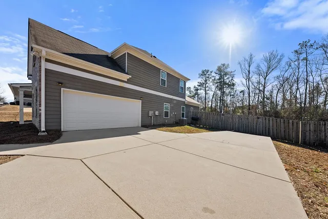 a view of front door of house with an outdoor space