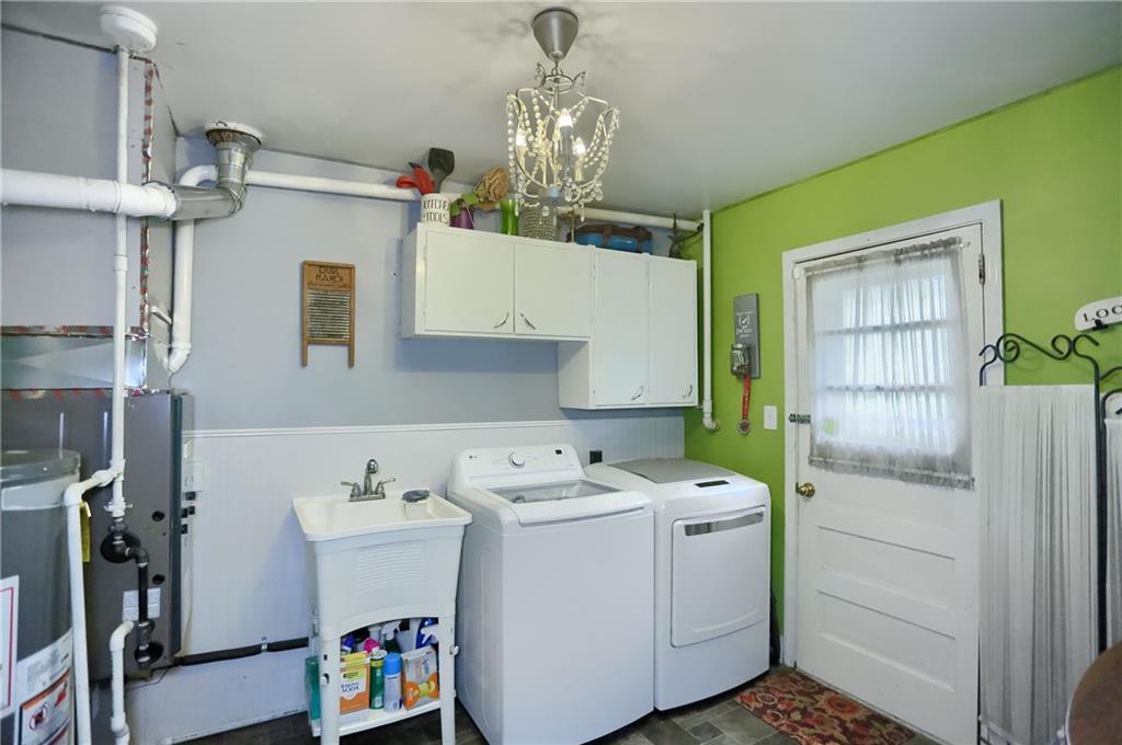 1247 Old Rte 18 Wampum, PA 16157 - Photo 24 of 24 Utility Room with pantry strorage