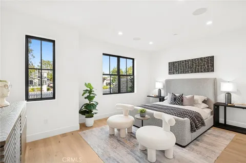 a bed room with bed and a window